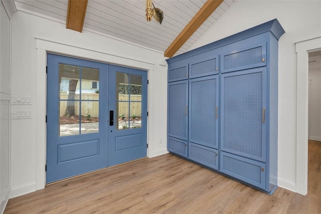 247 Circle Dr, Saint Simons Island, GA 31522 - doorway to outside with french doors, wooden ceiling, light wood-style floors, and baseboards