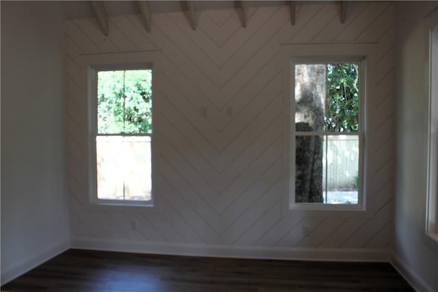 247 Circle Dr, Saint Simons Island, GA 31522 - unfurnished room featuring baseboards and dark wood-style floors
