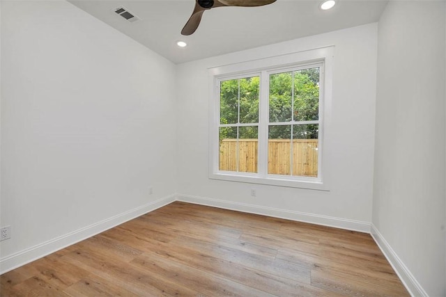 247 Circle Dr, Saint Simons Island, GA 31522 - spare room with wood finished floors, baseboards, a ceiling fan, and recessed lighting