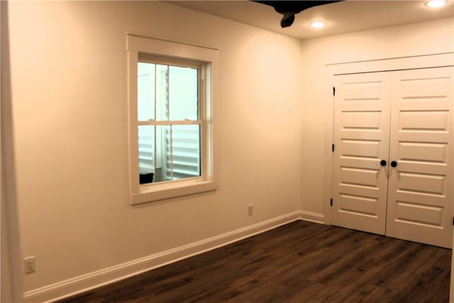 247 Circle Dr, Saint Simons Island, GA 31522 - empty room featuring dark wood-type flooring, baseboards, and recessed lighting
