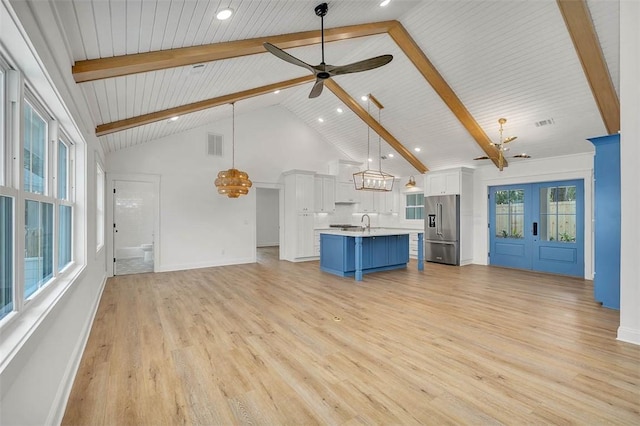 247 Circle Dr, Saint Simons Island, GA 31522 - unfurnished living room featuring light wood finished floors, high vaulted ceiling, ceiling fan, a sink, and recessed lighting