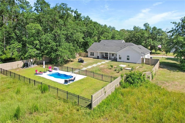 1317 Kyles Loop NE, Townsend, GA 31331 - rear view of house featuring a patio and a fenced backyard