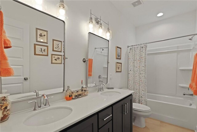 1317 Kyles Loop NE, Townsend, GA 31331 - bathroom with double vanity and shower / bath combo with shower curtain