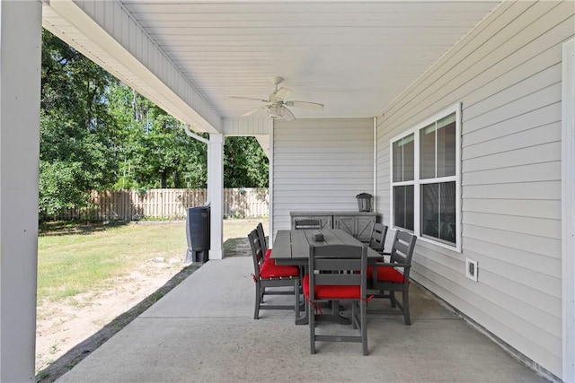 1317 Kyles Loop NE, Townsend, GA 31331 - view of patio with outdoor dining area and ceiling fan