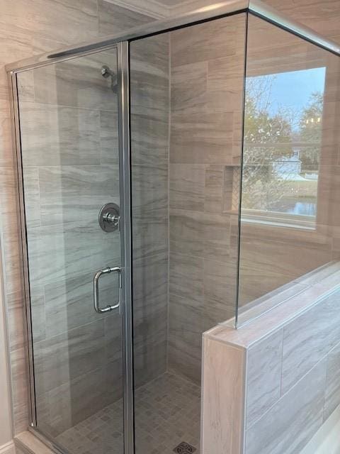 bathroom with walk in shower