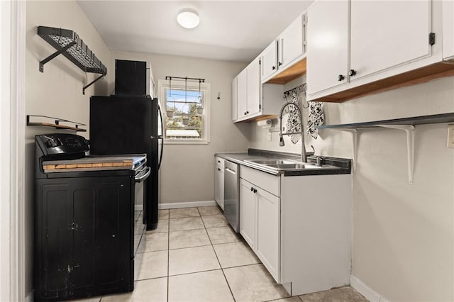 kitchen with light tile patterned floors, dishwasher, black range with electric cooktop, white cabinetry, and a sink