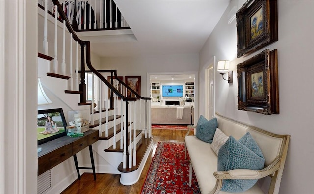 foyer entrance featuring wood-type flooring