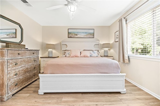 850 Mallery St Unit 3M, Saint Simons Island, GA 31522 - bedroom featuring light wood finished floors and a ceiling fan