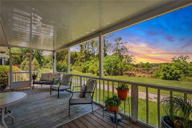 wooden deck with a yard