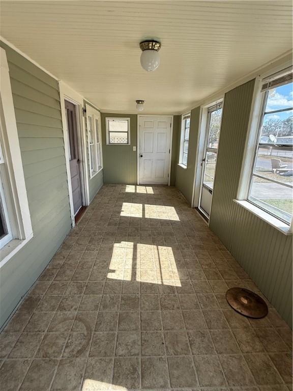 view of unfurnished sunroom