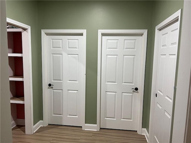 116 Bartram Trl, Blackshear, GA 31516 - hallway featuring light wood-style flooring and baseboards