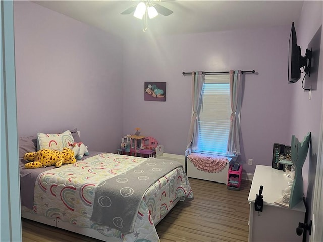 116 Bartram Trl, Blackshear, GA 31516 - bedroom with wood finished floors and a ceiling fan