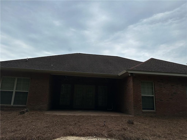 116 Bartram Trl, Blackshear, GA 31516 - back of property with brick siding and a shingled roof
