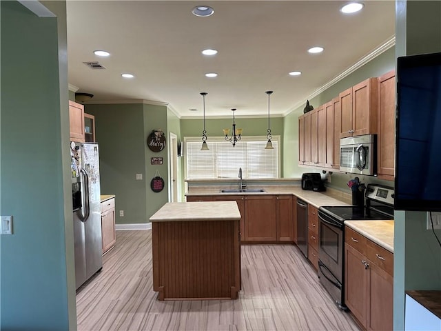 116 Bartram Trl, Blackshear, GA 31516 - kitchen featuring stainless steel appliances, a sink, crown molding, a center island, and recessed lighting