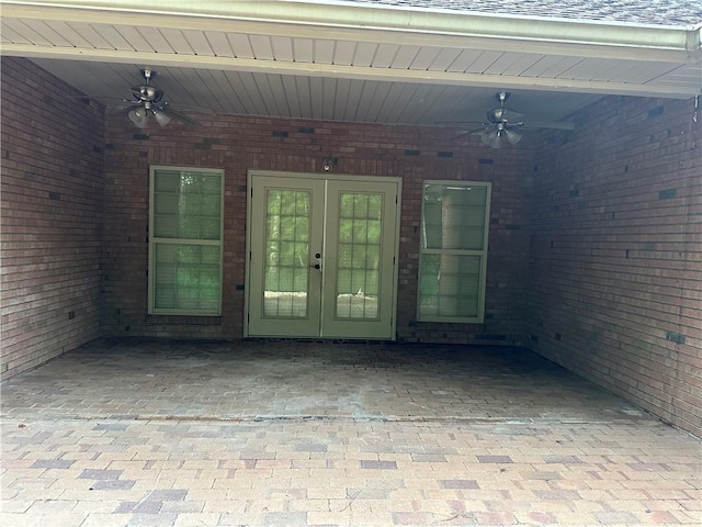 116 Bartram Trl, Blackshear, GA 31516 - doorway to property featuring ceiling fan, french doors, and brick siding