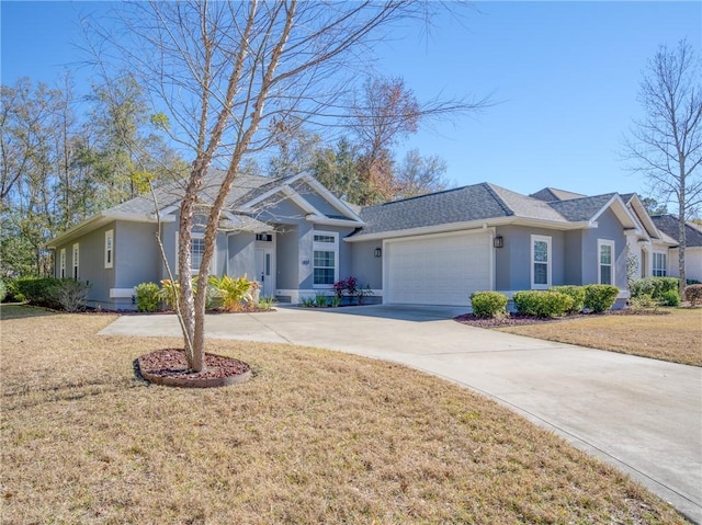 ranch-style home with a garage and a front lawn