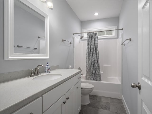 full bathroom with shower / tub combo with curtain, vanity, and toilet