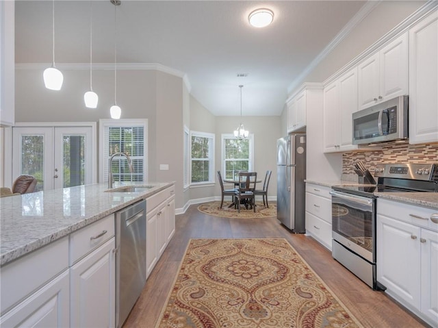 kitchen featuring white cabinetry, appliances with stainless steel finishes, and sink