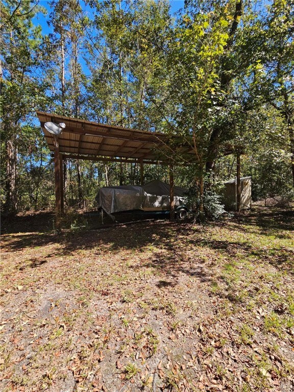 view of car parking with a carport