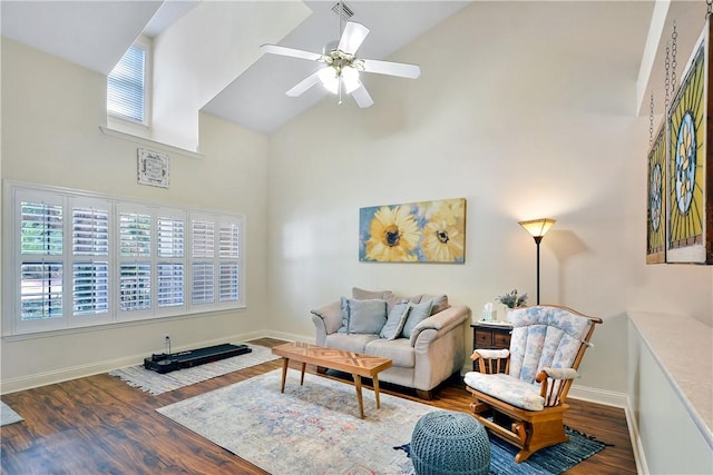 living room with ceiling fan, hardwood / wood-style flooring, high vaulted ceiling, and a healthy amount of sunlight