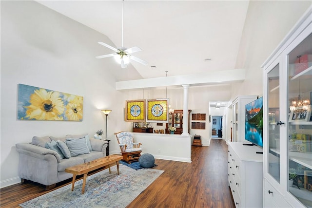 living room with dark hardwood / wood-style flooring, high vaulted ceiling, ceiling fan, and ornate columns