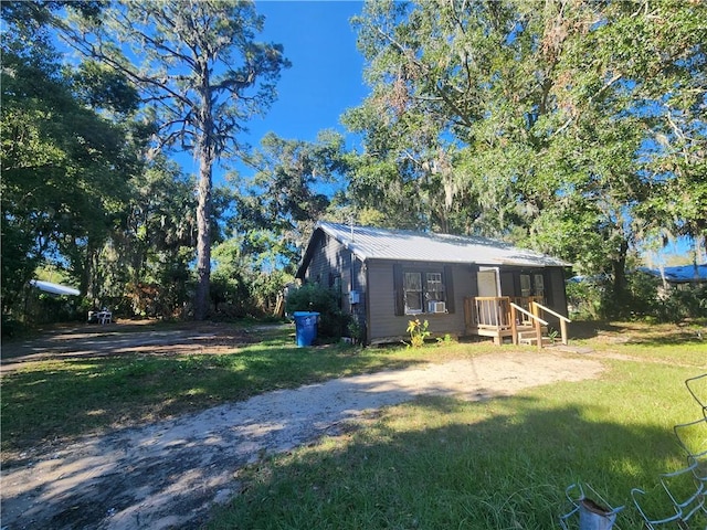 exterior space with a front yard