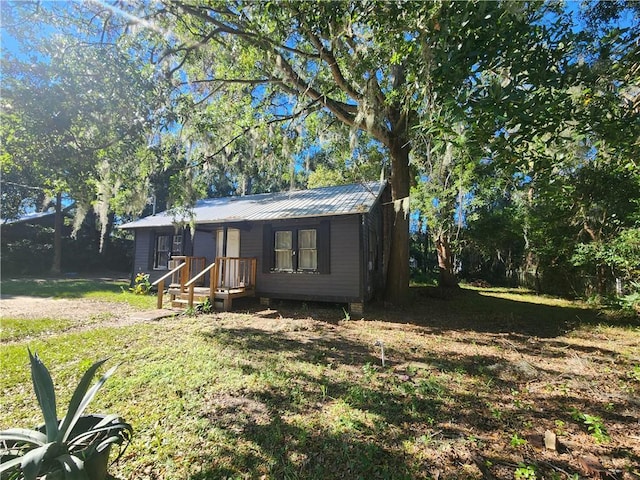 exterior space with a lawn