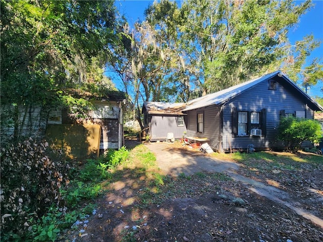 view of property exterior featuring cooling unit