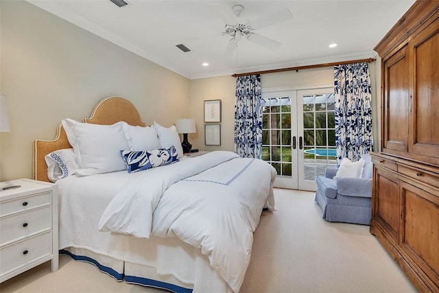 bedroom featuring light carpet, access to outside, visible vents, and french doors