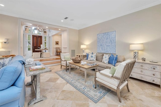 living area with recessed lighting, visible vents, and crown molding