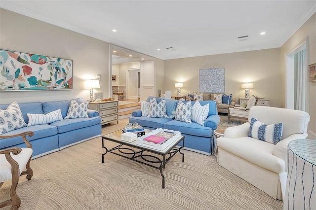 living area featuring light carpet, ornamental molding, and recessed lighting