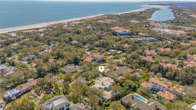 drone / aerial view with a water view and a residential view