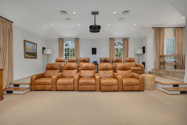 carpeted cinema room featuring a wealth of natural light, visible vents, and recessed lighting