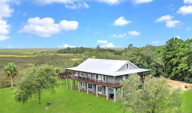 birds eye view of property with a rural view