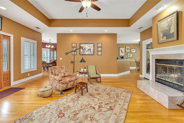 189 Harbor Pointe Dr, Brunswick, GA 31523 - living room with wood finished floors, a chandelier, ceiling fan, baseboards, and recessed lighting