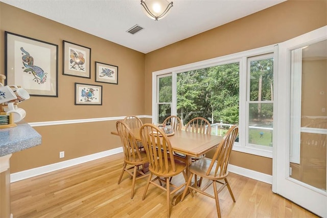 189 Harbor Pointe Dr, Brunswick, GA 31523 - dining space with light wood-type flooring and baseboards