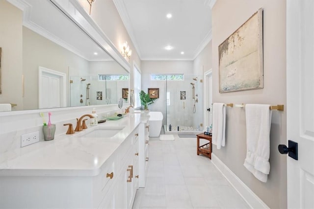 bathroom featuring tile patterned flooring, vanity, a shower with door, and crown molding