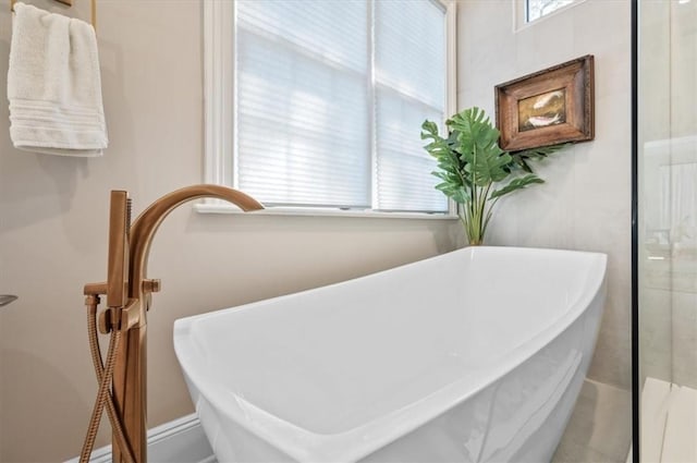 bathroom with a washtub