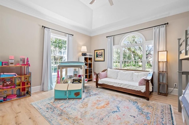 sitting room featuring ceiling fan and light wood-type flooring