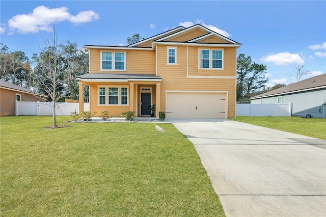 view of front of house with a garage and a front lawn