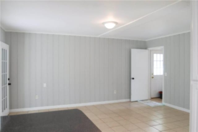 695 Lanes Bridge Rd, Jesup, GA 31545 - unfurnished room with baseboards and light tile patterned floors