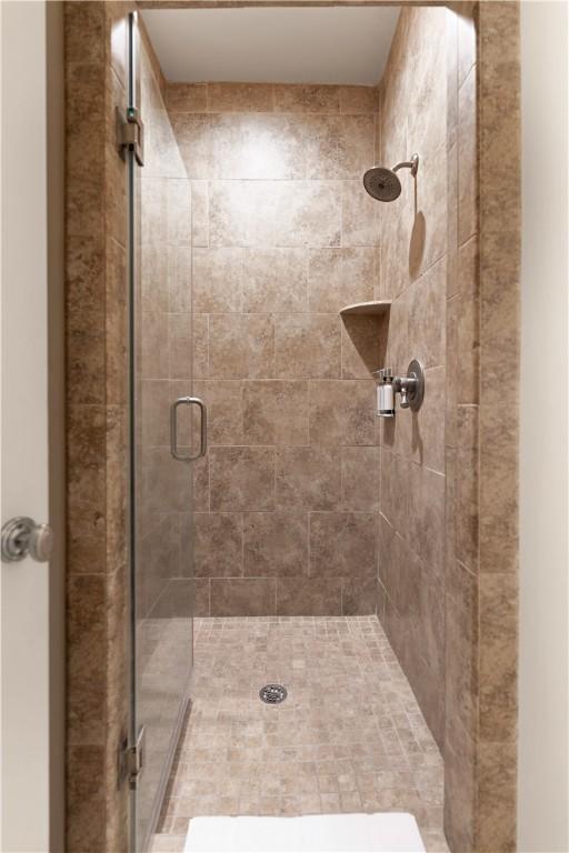 bathroom featuring walk in shower