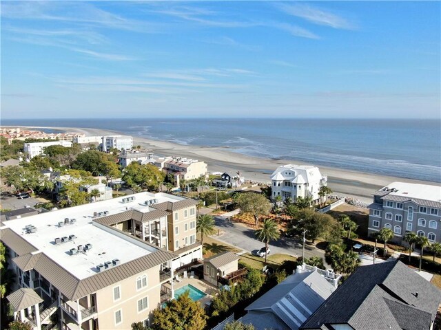 birds eye view of property featuring a view of the beach and a water view