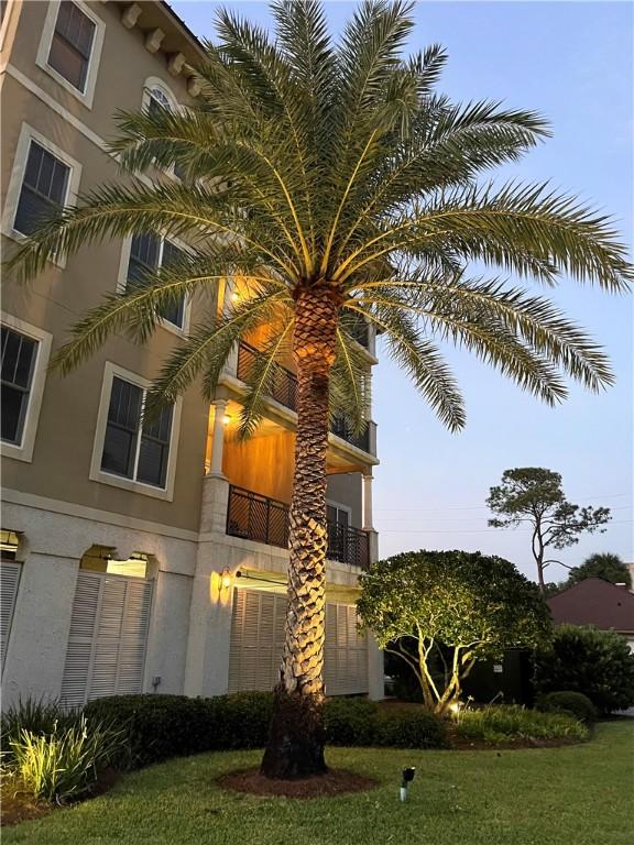 view of outdoor building at dusk