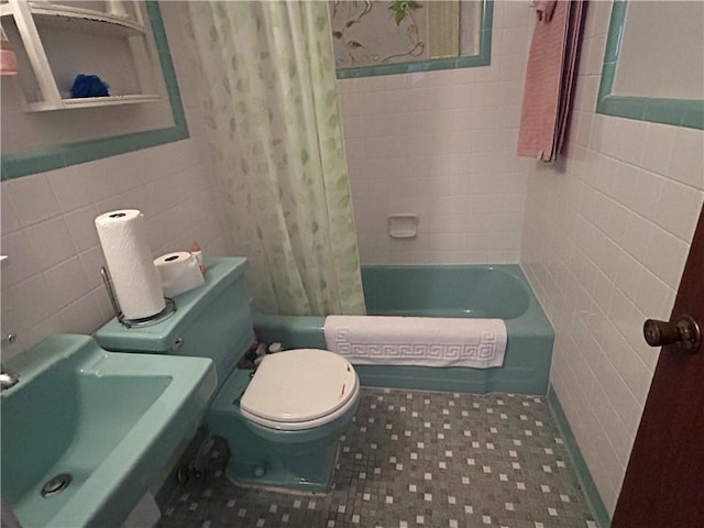 bathroom with shower / bath combination with curtain, toilet, and tile walls