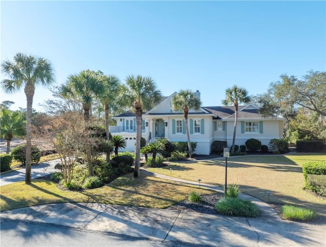 view of front of property with a front lawn