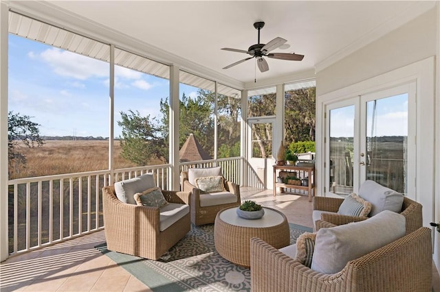 sunroom / solarium with french doors and ceiling fan