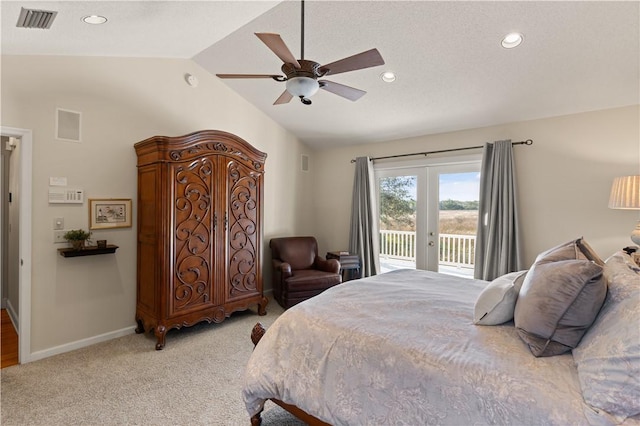 bedroom with ceiling fan, access to exterior, light carpet, vaulted ceiling, and french doors