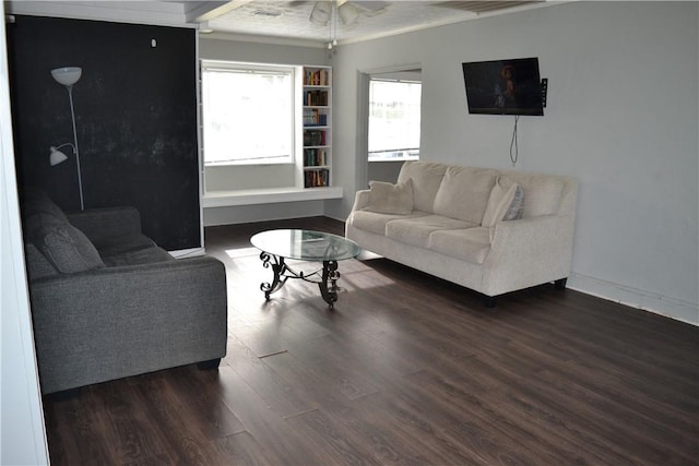 1308 Dean Dr, Waycross, GA 31501 - living room featuring dark wood-style floors, a ceiling fan, and crown molding