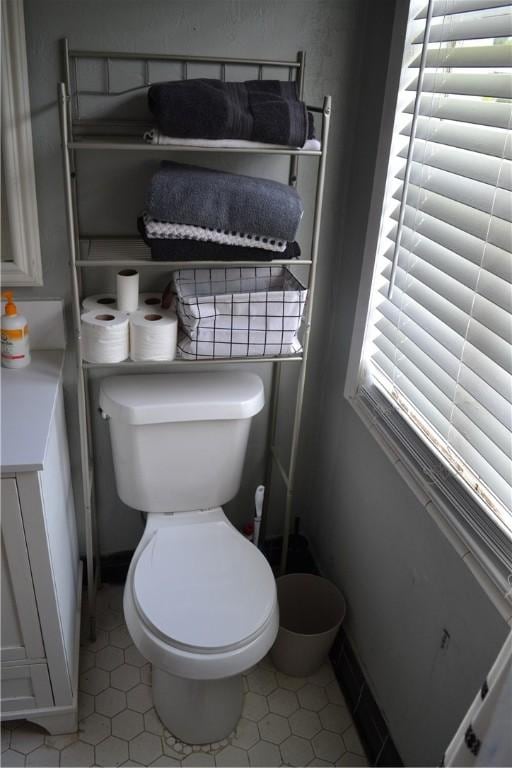 1308 Dean Dr, Waycross, GA 31501 - half bathroom with toilet and tile patterned flooring